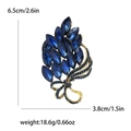Elegante spilla vintage con cristalli blu navy e finitura dorata con misure incluse - Blu