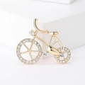 Elegant gold bicycle brooch with sparkling white zircons on minimalist white background - Gold (MM-BR-2095)