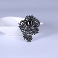 Vintage gun black crystal brooch with grey rhinestones in a baroque leaf design - Gunmetal
