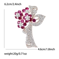 Detail view of flower brooch with pink rhinestones and dimensions 6.2cm by 4.6cm - MM-BR-2224 Red