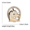Enamel unicorn horse shoe brooch with sparkling white rhinestones in gold finish - White