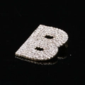 Detailed macro view of golden letter B brooch with sparkling rhinestones on black background - Letter B (MM-BR-2144) / Gold