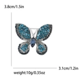 Elegant butterfly brooch in silver alloy with blue rhinestones and 3.8cm size detail - Blue (2063-BL)
