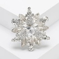 Elegant silver snowflake brooch with sparkling crystal rhinestones in marquise and pear cuts - White