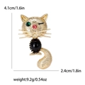 Goldene Katzen-Brosche mit schwarzem Edelstein und bunten Strasssteinen für Damen - Gold