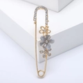 Broche fleurie avec cristaux et épingle dorée pour gilets et accessoires de mode - Gris