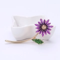 Exquisite purple daisy flower brooch with green leaf and gold-plated finish - Purple