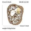 Vintage alloy rhinestone brooch details showing dimensions of 5.5cm by 4.3cm - Brown
