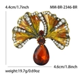 Vintage ginkgo blad broche met witte kristallen en een grote oranje edelsteen - Bruin