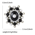 Vintage gold sunflower brooch with black stone and pearls, measuring 5.5cm x 5.1cm - Gold