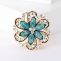 Broche de flor vintage en aleación con piedras de mármol azul y cristales en base blanca - Azul