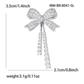 Silver bow brooch with sparkling zircon stones and tassels measuring 3.5cm by 2.1cm - Bow Tassel Style (8041-SL) / Silver