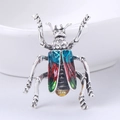 Vintage beetle brooch in silver alloy with multicolor gradient enamel and crystals - Blue