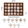 Détails du coffret de 24 boules de Noël montrant diverses textures pailletées et mates - Or champagne