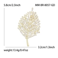 Elegant gold leaf brooch with baguette-cut zircons for suits, size 5.8cm by 3.2cm - Gold