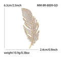 Spilla a piuma dorata con zirconi, dimensioni 6,3 cm x 2,4 cm su sfondo bianco - Oro (MM-BR-8009-GD)