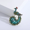 Vintage peacock brooch featuring colorful crystals and emerald rhinestones on gold base - Emerald Green Style (2530)