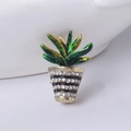 Miniature green cactus enamel pin with crystal pot detail on white ceramic base - Green