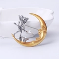 Detail of vintage matte fairy and moon brooch with silver finish and white pearls - Silver