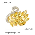 Elegante spilla a cigno con pietre marquise gialle e cristalli su base in oro - Giallo