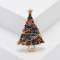 Golden Christmas tree brooch with colorful rhinestones on a minimalist white block - Mixed Multi-color