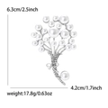 Elegante spilla a bouquet di perle con fiocco in metallo argento e dettagli strass - Argento