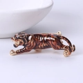 Detailed view of enamel tiger brooch with brown and black metal stripe craftsmanship - Brown
