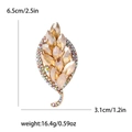 Elegante spilla a foglia con cristalli ambra e strass AB su base in lega dorata - Champagne