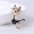 Cat brooch with black enamel, pink cat-eye stone, and golden glasses on ceramic plate - Black