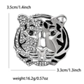 Detailed view of silver tiger head brooch with rhinestones and black enamel stripes - Silver