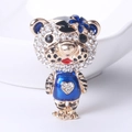 Cartoon tiger brooch with sparkling crystals and blue enamel finish on gold base - Blue