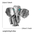 Retro elephant brooch in silver alloy with green gemstone eyes and detailed dimensions - Antique Silver