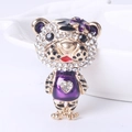 Cute golden tiger brooch with purple enamel and sparkling crystal heart detail - Purple