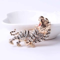 Golden roaring tiger brooch pin encrusted with white rhinestones and black enamel stripes - Gold