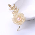 Elegant gold-tone rose brooch with pink pearl center and crystal leaf details - Gold