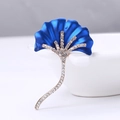 Elegant ginkgo leaf brooch in royal blue enamel and gold finish with white rhinestones - Blue