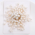 Macro detail of hand-woven pearl flower brooch with gold wire on a handmade display card - White (MM-BR-7101)