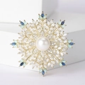 Elegant snowflake brooch with large pearl and multicolor zircon stones on gold base - Green
