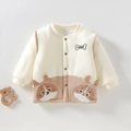 Detail van gewatteerd babyvest met schattig hondenborduurwerk en zachte katoenen textuur - 73 / Khaki