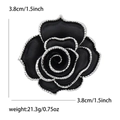 Eleganter schwarzer Kamelienblumen-Anstecker mit Silberkanten für Anzüge und Pullover - Schwarz
