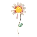 Detailed view of daisy brooch with yellow amber core and pink zircon inlaid petals - Purple