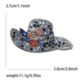 Dettagli della spilla a cappello con strass, dimensioni 5,0x2,7 cm e peso di 11,1 g - Blu