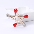 Creative matchstick star brooch with gold alloy and red enamel rhinestone details - Red (MM-BR-2680)