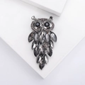 Retro owl brooch pin in dark gunmetal with grey crystals and black gem eyes on white stand - Gray (2734)