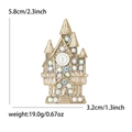 Vintage gold castle brooch pin with iridescent rhinestones and small white clock face - Gold