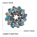 Retro flower brooch with blue marquise crystals and silver metal base for women - Light Blue