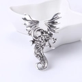 Vintage silver dragon brooch with detailed wings and scales in antique finish - Silver