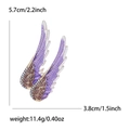 Broche ailes d'ange en alliage violet avec strass mesurant 5,7cm par 3,8cm - Violet Or
