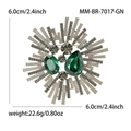 Spilla barocca vintage con cristalli verdi e strass a forma di sole radioso - Verde