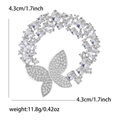 Elegante spilla a corona con farfalla in argento e zirconi chiari, diametro 4,3 cm - Argento